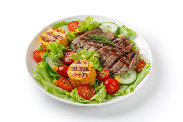 Roast beef salad isolated on white background with clipping path. Cut out. Salad, meal with meat steak, grilled corn and beef meat with vegetable. Diet dinner concept.