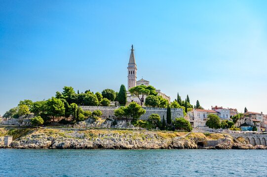 Rovinj. Istra, Croatia. Church of Saint Euphemia. View on peninsula from sea
