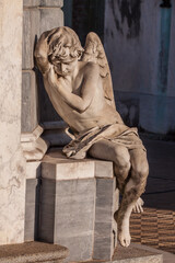 Argentina, Buenos Aires. Statue of an angel at the entrance to a tomb in Recoleta Cemetery.
