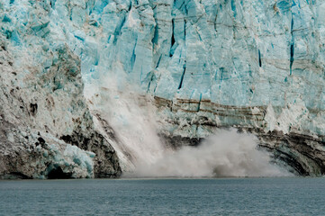 Giant chunks of ice calve from Margerie Glacier, Glacier Bay.