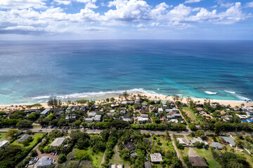 Aerial view of the north shore of Oahu, Hawaii, overlooking Ehukai Beach known for its large winter...