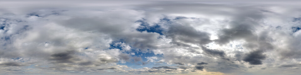 overcast skydome with cumulus clouds as seamless hdri 360 panorama with zenith in spherical...