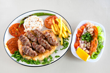 Meatball between bread (Turkish name : ekmek arasi kofte ). Izgara kofte