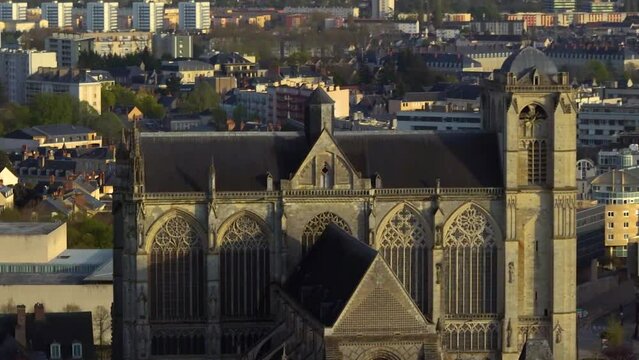 Cityscape of Le Mans, it is a city in France, on the Sarthe River. Filmed during the summer. Le Mans is located in the Pays de la Loire region, western France. Aerial view