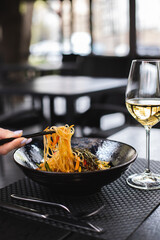 Stylish serving of food in the restaurant. Serving. Waiter