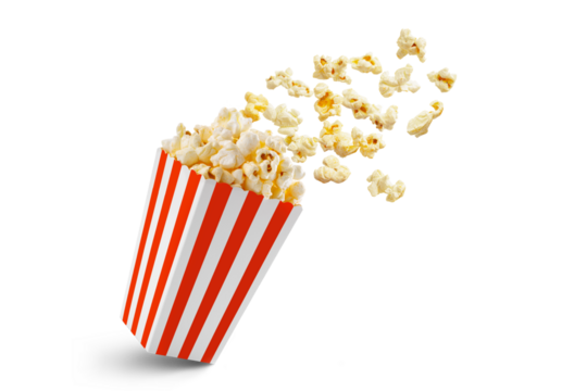 Popcorn flying out of red white striped paper box isolated on white, transparent background, PNG, with copy space. Splash, levitation of popcorn grains.