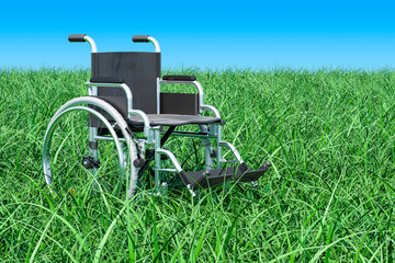 Fototapeta na wymiar Wheelchair on the green grass against blue sky, 3D rendering