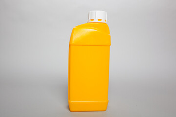 Yellow plastic canister with white lid