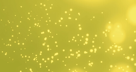 Obraz na płótnie Canvas Composition of light spots on yellow background
