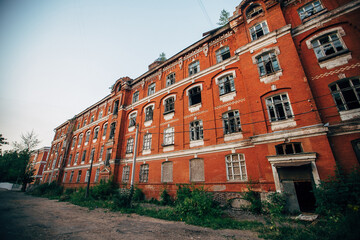 Old abandoned red brick building. Morozov barracks, Tver