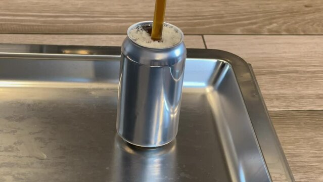 Filling can with homebrew beer using wand filling equipment