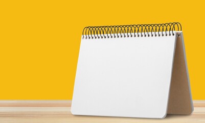 2023 office desk calendar on table.