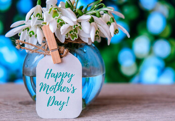 Happy Mothers Day lettering greeting card. Spring flowers snowdrop. Best mom ever. Holiday concept. - obrazy, fototapety, plakaty