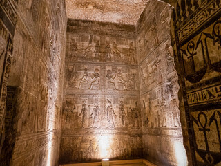 Dendera Temple complex  is one of the best-preserved temple complexes of ancient Egypt. The dominant building in the complex is the Temple of Hathor. Here we see its interior decorated walls.