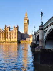 Fototapeta na wymiar Portrait of Mr. Big Ben and its reflection on river Thames. London, UK