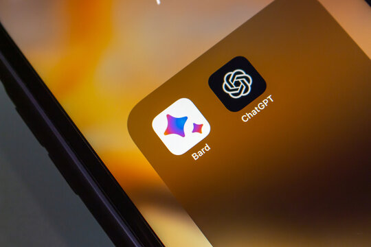 Vancouver, CANADA - Apr 19 2023 : Google Bard and OpenAI ChatGPT icons seen in an iPhone screen.