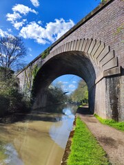 Fototapeta premium Old railway bridge over the river, a piece of history located in Leamington spa