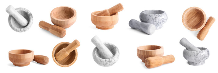 Set of wooden and stone mortars on white background