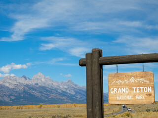 Wyoming, Grand Teton National Park. Entrance Sign with Teton Range
