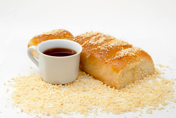 Bread cheese with nuts and tea on a white background
