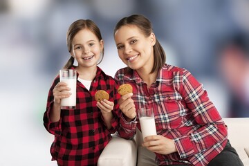 Cute child drinking milk smiling happily