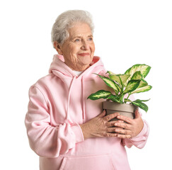 Senior woman with houseplant on white background