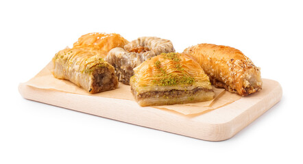 Wooden board with tasty baklava on white background