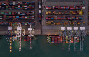 Fototapeta na wymiar Top view of International Container ship loading, unloading at sea port, Freight Transportation, Shipping, Vessel. Logistics, import export, Transportation. Global transport business.