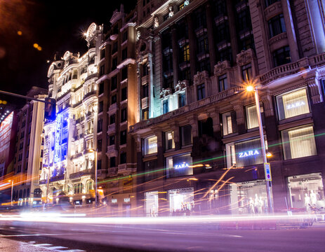 Madrid Spain. May 24, 2018. Long exposure photography that shows the shops and their illuminated marquees on Gran Vía.