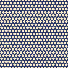 seamless pattern of soft cream polka dots on a blue background for fabric, paper, wallpapers, backgrounds