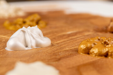 Abstract chaotic painting on canvas with gold paints