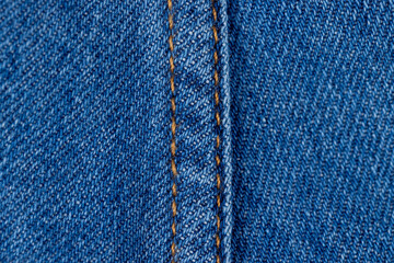 details of a blue denim fabric made of natural cotton