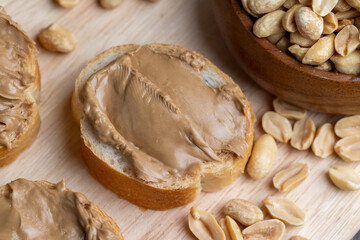 Peanut paste on a soft wheat baguette