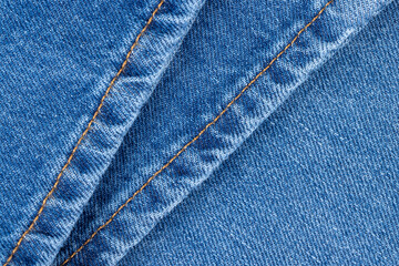 Naklejka premium close-up of a new blue denim fabric