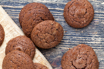chocolate cookies on a wooden board