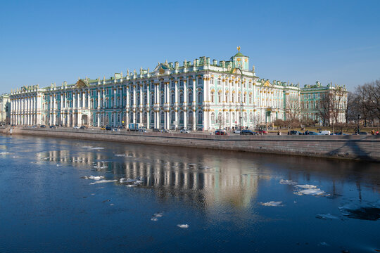 View of the Winter Palace (Hermitage) from the Palace Bridge on a sunny April day. Historic center of St. Petersburg
