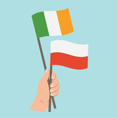 Flags of Ireland and Poland, Hand Holding flags