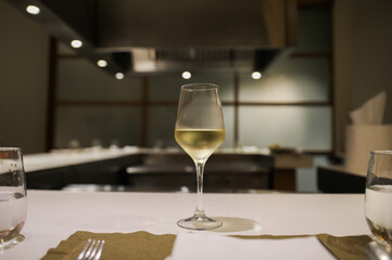 refinement and indulgence, a fancy wine glass in a restaurant represents a celebration of taste, culture, and socializing. It evokes feelings of luxury, pleasure, and conviviality