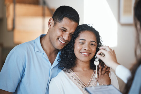 Keys. realtor and a home owner couple in their new house after payment or investment in a property asset. Real estate, mortgage or loan with a man and woman receiving the key to their new house