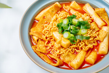 Rabokki, Korean style Stir-fried Instant Noodle : This dish is tteokbokki with ramen noodles. Tteokbokki is a spicy dish made with rice cake, vegetables, and fish cake, all stir-fried together in a go