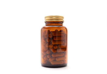Isolated Brown Glass Bottle With Softgel Capsules OF Slippery Elm On Whitet Background, Copy Space...
