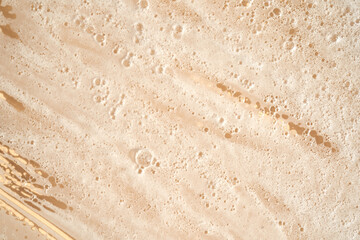 Photo of the texture of cosmetic foam or soap.
