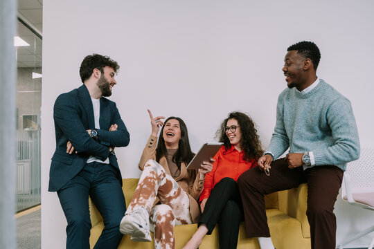 Pointing while laughing