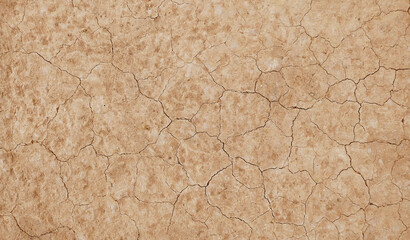 Cracked ground background in the top view for graphic design or wallpaper