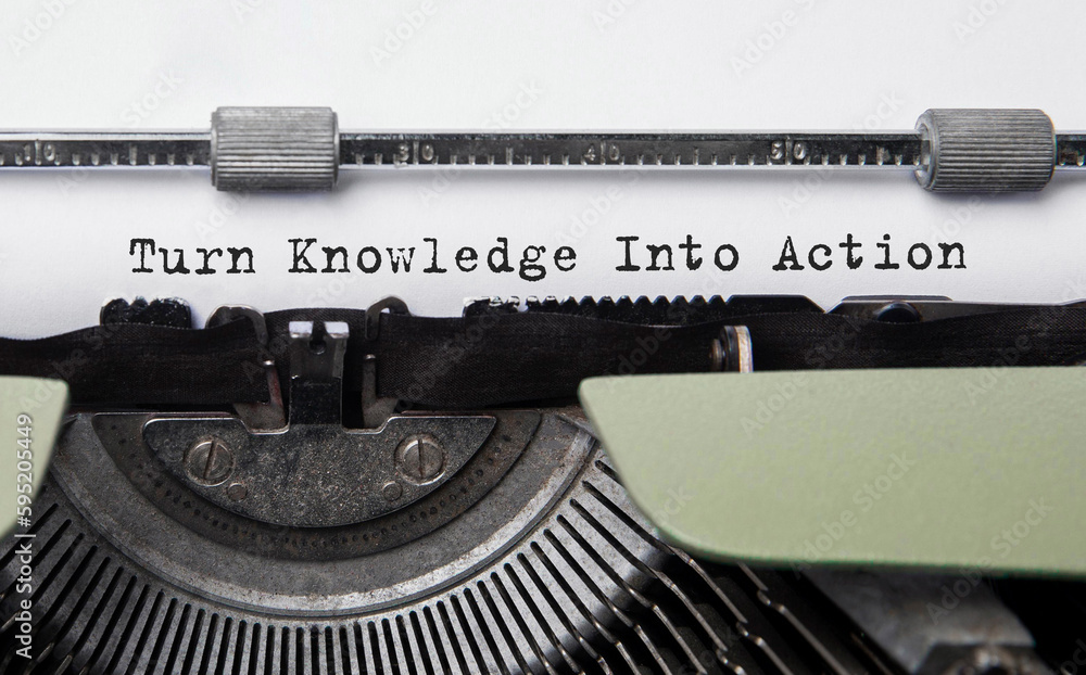 Poster text turn knowledge into action typed on retro typewriter