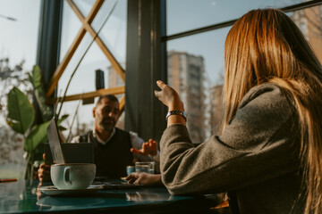 Close up of business woman pointing with her hand