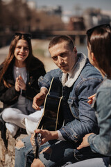 Close up of man playing guitar