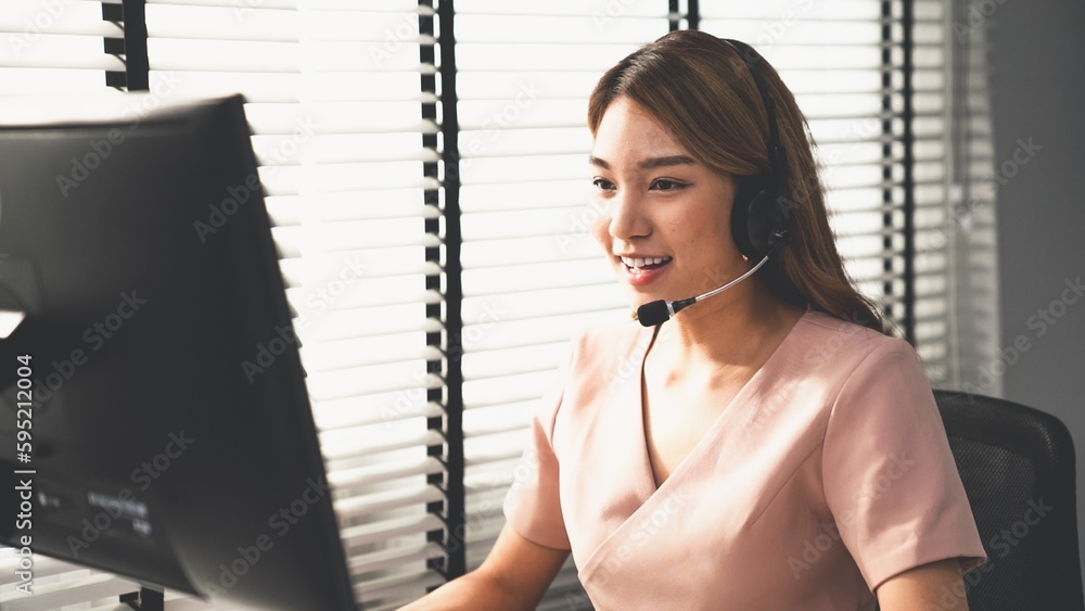 Aufkleber competent female operator working on computer and while talking with clients. concept relevant to bo