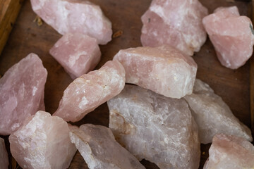 macro shooting of natural gemstone - tumbled rose quartz mineral gem stone