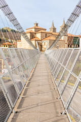 Suspension bridge, for the passage of people, and cross the Narcea river in Cangas del Narcea, Asturias, Spain